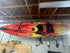Tie Boss pulley system lifting a kayak for space-saving storage.